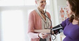 FR6ACG pregnant woman having medical examination